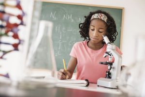 A student works on her lab report.
