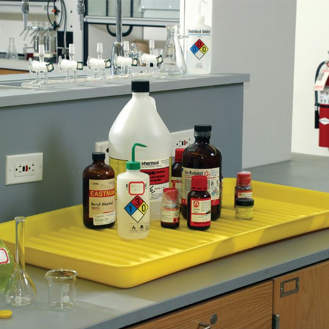 Chemicals safely stored in a chemical tray