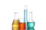 Colored solutions in laboratory glassware.