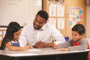 A teacher works with 2 students.